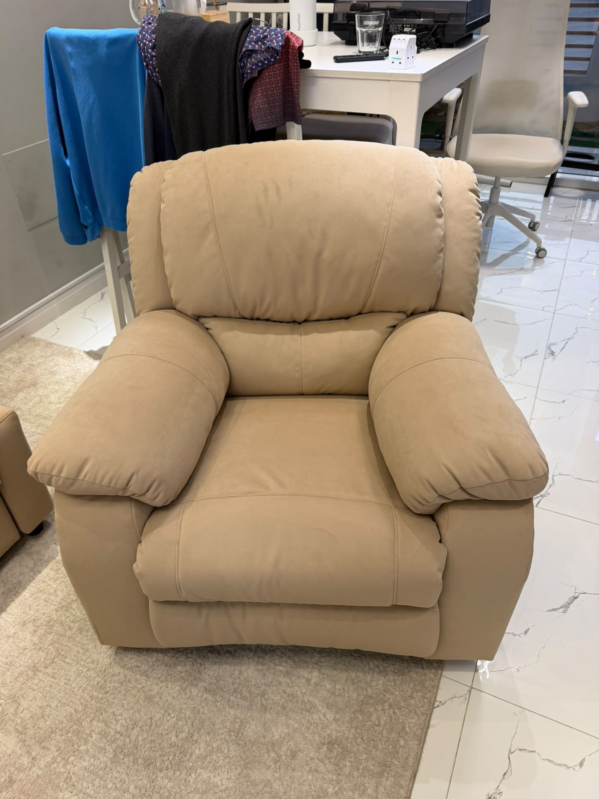 Beige armchair reupholstered by Dune Home in Dubai